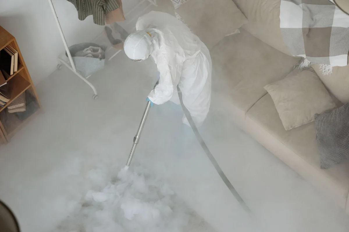 Biohazard cleanup technician in protective equipment, Mill Valley, CA
